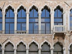 Detail of the façade of palazzo Fortuny in Venice