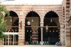 Aqsunqur Mosque in Cairo with its striking blue tiles and intricate architectural details