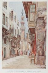 Street scene with mosque and minaret in Cairo