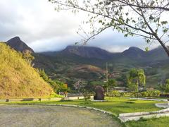 view of mountains with sky and clouds