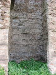 Remains of brick reinforcement of Aqua Claudia with impressions of stone blocks.