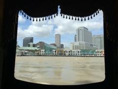 View of New Orleans cityscape through a window