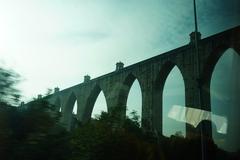 view of the 25th of April Bridge in Lisbon Portugal at sunset