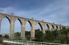 Aqueduto das Águas Livres in Lisbon, Portugal, featuring stone arches over the Alcântara valley