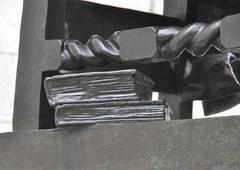 Books under the John Harvard statue in Harvard Yard