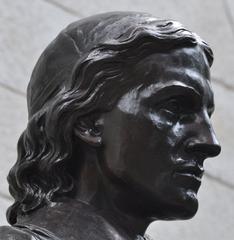 right side head shot of John Harvard statue in Harvard Yard