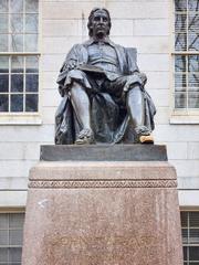 John Harvard statue in Cambridge, Massachusetts taken on February 20, 2023