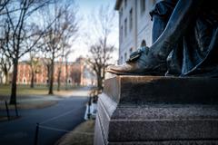 worn left shoe on the John Harvard statue