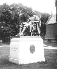 John Harvard statue at its original site west of Memorial Hall