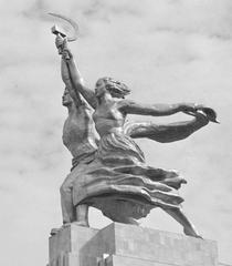 Sculpture of a male worker holding a hammer and a female kolkhoz worker holding a sickle, symbolizing Soviet unity