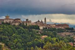 Bergamo city view with historical buildings and a bell tower at dusk