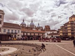 Plaza San Francisco Cuenca with cathedral domes and Cuenca letters