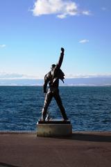 Statue of Freddie Mercury by Lake Leman in Switzerland with scenic background