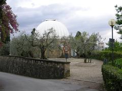 Osservatorio di Arcetri planetarium building with a dome and scenic surroundings