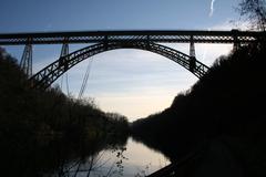 Bridge over the Adda river between Calusco d'Adda and Paderno d'Adda viewed from the north against the sun