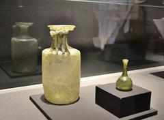 Ancient Roman glass bottle and ointment jar