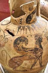 ancient Greek amphora with lion and sphinx illustrations