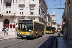 Lisbon bus with tram cables overhead