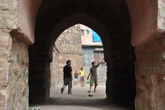 Kids playing cricket in the mosque compound