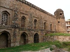 Exterior view of a Mosque with latticed Khirkis on the second floor