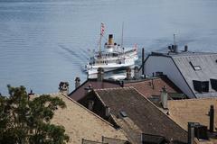 100 year old steam boat approaching Nyon old town