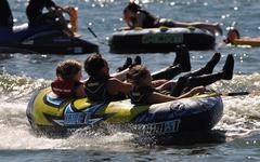 Jet Skis forming a doughnut shape on the water