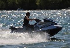 Jet ski speeding on water