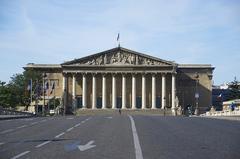 facade of the National Assembly in Paris from Pont de la Concorde