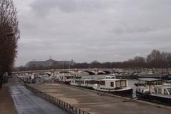 Moored boats by Pont de la Concorde at Port de Solférino, Paris