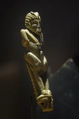 Knife handle made of bone featuring a sculpted figure of the god Pan