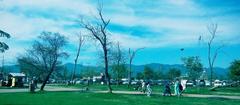 Entrance of Islamabad's Lake View Park on a sunny day