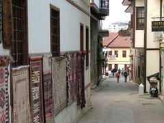 Colorful Turkish rugs displayed on a street