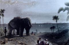 life-sized stone elephant with men and ships in the background