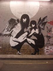 Leake Street graffiti artwork with angel and vampires