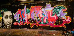 colorful street art in Leake Street Arches, London