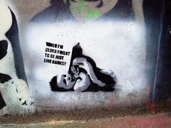 Banksy artwork of a baby in Leake Street, London