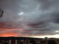 Cloudy sunset in Montes Claros with red hues