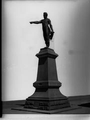 Memorial statue of Colonel William Light against a blue sky