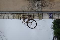 Bicycles mounted as an advertisement for a bike workshop in Périgueux