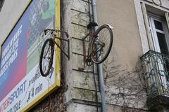 bicycles mounted as advertising for a bike workshop in Périgueux