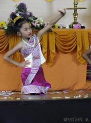 Laotian child dancing at Buddha festival in Strasbourg