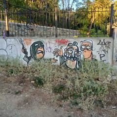 Graffiti of protestor with Molotov cocktail in Thessaloniki