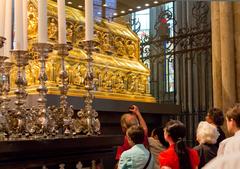 Pilgrims passing underneath the Shrine of the Three Kings at Cologne Cathedral