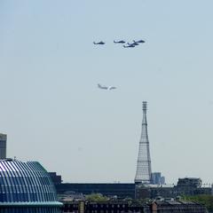 aircraft flying near the Shukhov Tower in Moscow after a parade