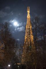 Hyperboloid moon with Shukhov tower in Moscow at night