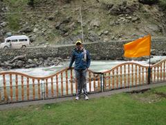 Tourist boy beside Lidder river near Betaab Valley