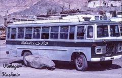 Bus in Jammu and Kashmir with mountainous landscape