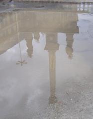 Photo of a cultural monument in Brno, Czech Republic, reflecting on the water