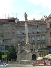 Liberty Square in Brno with historic buildings and a modern black clock