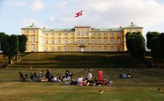 People enjoying summer evening at Frederiksberg Gardens